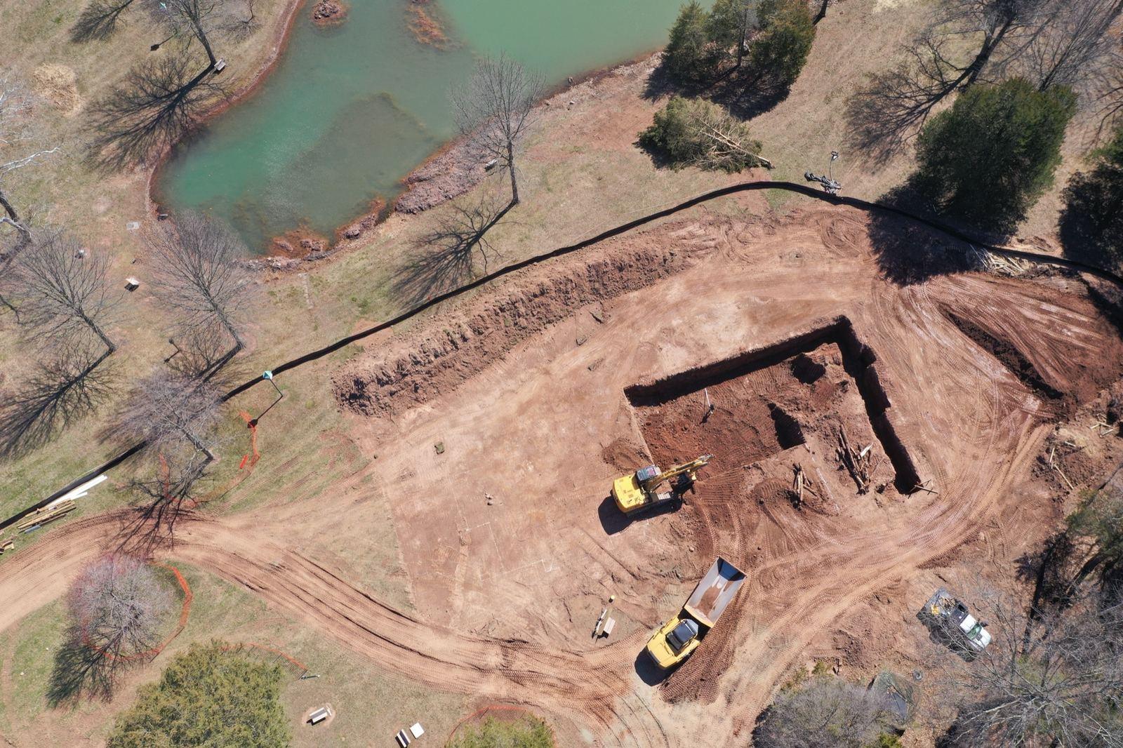 A foundation dig beside the pond at Haymarket.