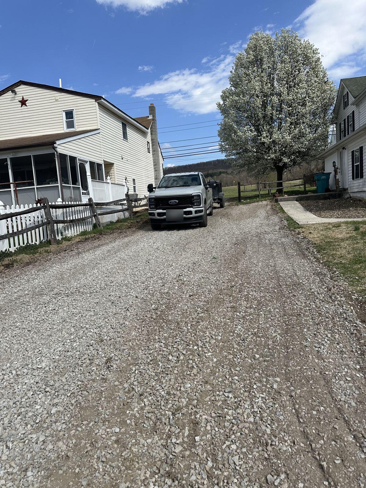 A Ford F-350 on the finished driveway at Mapleville.