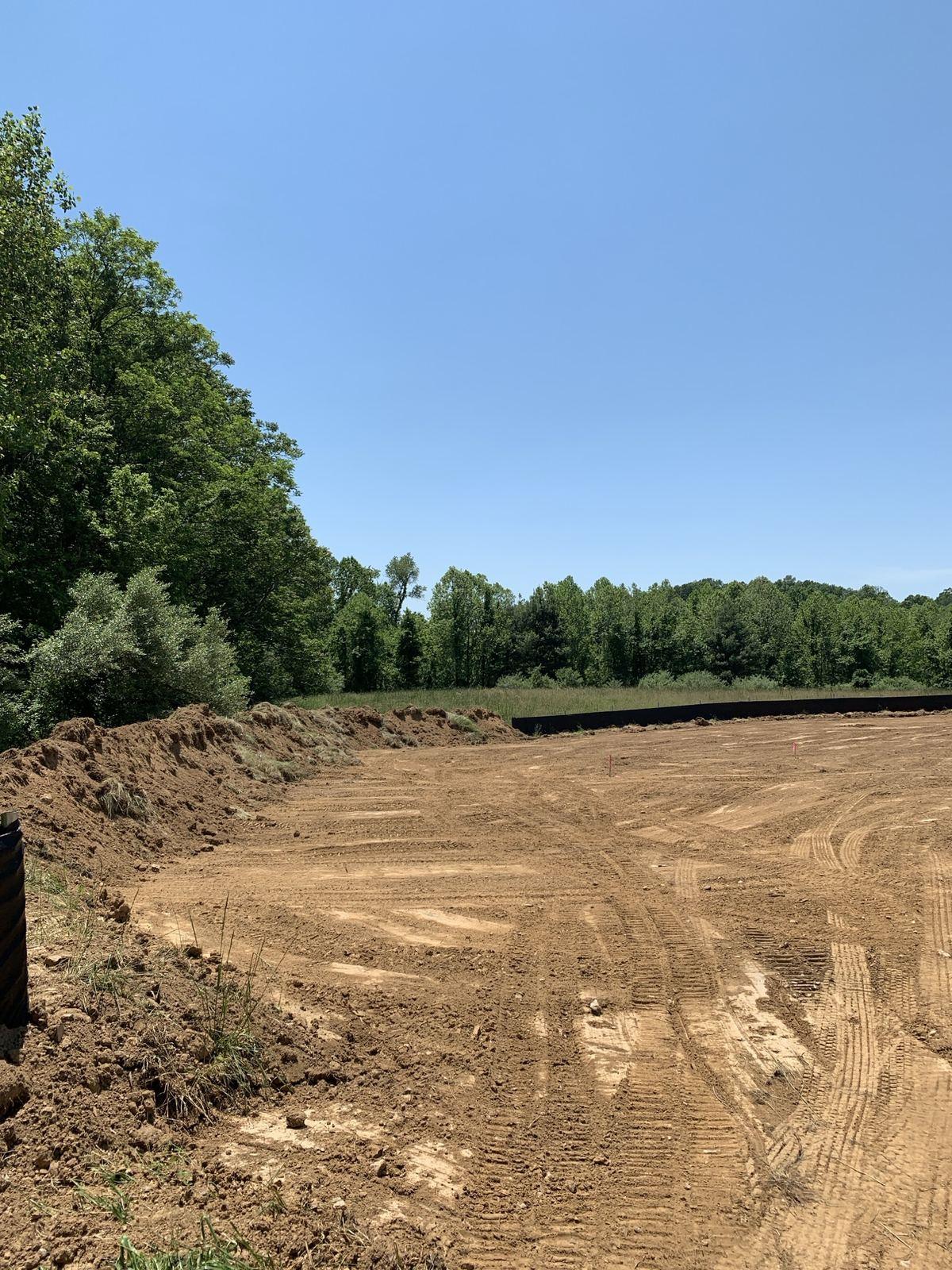 The rough-graded drive corridor.