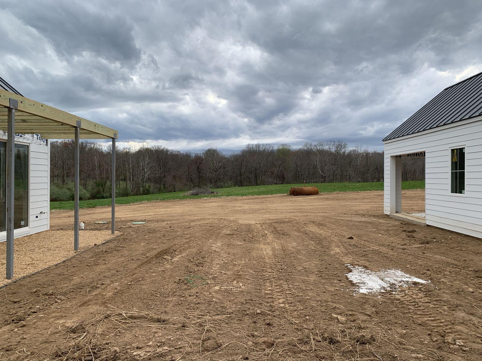 Final grade sloped away from a new house in Purcellville.